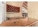 Built-in bar with a wine rack and decorative tile backsplash at 7722 W Libby St, Glendale, AZ 85308
