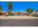 Charming home featuring a tile roof, mature landscaping and desert landscaping for low maintenance at 7722 W Libby St, Glendale, AZ 85308