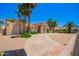 Well-maintained home with mature landscaping, long driveway, and desert landscaping for low maintenance at 7722 W Libby St, Glendale, AZ 85308