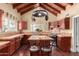 Charming kitchen featuring an island and pot rack overhead at 7722 W Libby St, Glendale, AZ 85308