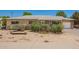Charming single story home with a desert landscaped front yard and stone accents at 8713 E Rancho Vista Dr, Scottsdale, AZ 85251