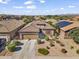 Beautiful single-story home featuring desert landscaping, a two-car garage, and a tiled roof in a friendly neighborhood at 10749 W Lariat Ln, Peoria, AZ 85383