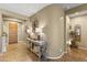 Inviting entryway featuring tile flooring, a decorative table, and a stylish wreath at 10749 W Lariat Ln, Peoria, AZ 85383