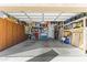 Organized garage with ample storage space and shelving units for efficient organization at 10749 W Lariat Ln, Peoria, AZ 85383
