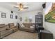 Recreational area with movie theme decor, ceiling fan, and seating for entertainment at 10749 W Lariat Ln, Peoria, AZ 85383