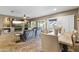 Open living and dining areas, with comfortable seating, modern amenities, and elegant decor at 10749 W Lariat Ln, Peoria, AZ 85383