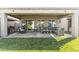 Spacious covered patio featuring stylish outdoor furniture, ideal for entertaining and relaxation at 10749 W Lariat Ln, Peoria, AZ 85383
