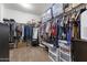 Spacious walk-in closet with ample storage space and convenient layout at 10749 W Lariat Ln, Peoria, AZ 85383
