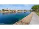 Beautiful waterfront homes with stunning water views and private docks, perfect for relaxed lakeside living at 10936 N Ventana W Dr, Peoria, AZ 85373