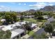 Aerial view of the community featuring well-manicured landscaping, common green areas, and mountain views at 1120 E Beryl Ave, Phoenix, AZ 85020