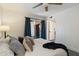Bright bedroom with a sliding glass door leading to a private outdoor space and an attached doorway at 1120 E Beryl Ave, Phoenix, AZ 85020