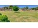 Beautifully manicured green space with mature trees, park benches and scenic desert landscaping at 1120 E Beryl Ave, Phoenix, AZ 85020