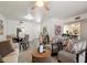 Bright, open-concept living room with dining area and neutral décor at 1120 E Beryl Ave, Phoenix, AZ 85020