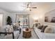 Light-filled living room with patio access, stylish furniture, and chic decor at 1120 E Beryl Ave, Phoenix, AZ 85020