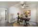 Office space features bright lighting, neutral tones, and a ceiling fan with views to adjoining spaces at 1120 E Beryl Ave, Phoenix, AZ 85020