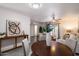 Beautiful living room with dining area; neutral paint and flooring at 1120 E Beryl Ave, Phoenix, AZ 85020