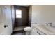 Modern bathroom with tiled shower, updated vanity, and natural light at 121 E Monte Way, Phoenix, AZ 85042