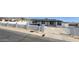 Charming single-story home featuring black trim, a concrete driveway, and a low-walled front yard at 121 E Monte Way, Phoenix, AZ 85042