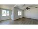 Bright room with a ceiling fan and neutral colors, creating a versatile and inviting atmosphere at 121 E Monte Way, Phoenix, AZ 85042