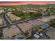 Aerial view of a spacious neighborhood showcasing homes with landscaped backyards and a desert landscape at 1410 S Los Altos Dr, Chandler, AZ 85286