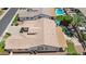 Overhead view of a house showcasing a backyard with a swimming pool, desert landscaping, and patio at 1410 S Los Altos Dr, Chandler, AZ 85286