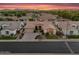 Expansive aerial view of a home with green landscaping, in a quiet residential neighborhood at 1410 S Los Altos Dr, Chandler, AZ 85286