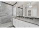 Elegant bathroom features a marble shower, modern fixtures, and a stylish vanity at 1410 S Los Altos Dr, Chandler, AZ 85286