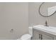 Half bath with contemporary features a sleek sink and vanity, perfect for guests at 1410 S Los Altos Dr, Chandler, AZ 85286