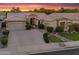Beautiful single Gathering home with manicured lawn and desert landscaping with a multi-car garage at 1410 S Los Altos Dr, Chandler, AZ 85286