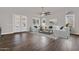 Bright living room featuring hardwood floors, modern furnishings, and an abundance of natural light at 1410 S Los Altos Dr, Chandler, AZ 85286