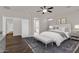 Relaxing main bedroom with plush bedding, a decorative rug, and an ensuite bathroom at 1410 S Los Altos Dr, Chandler, AZ 85286