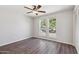 The spacious bedroom features natural light and a ceiling fan at 1452 E Gary St, Mesa, AZ 85203