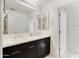 Modern bathroom with double vanity, sleek cabinets, and a large mirror for a bright, open feel at 1502 E Goldcrest St, Gilbert, AZ 85297