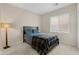 Cozy bedroom with soft carpet and a window for natural light at 1502 E Goldcrest St, Gilbert, AZ 85297