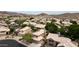 Elevated aerial view showcases a home nestled in a desert neighborhood with mountain views at 15235 S 30Th St, Phoenix, AZ 85048