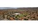 Aerial view of community close to schools and recreational areas, featuring desert landscape and mountain views at 15235 S 30Th St, Phoenix, AZ 85048