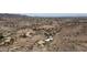 Panoramic aerial view featuring desert landscape, homes, and mountain views in the distance at 15235 S 30Th St, Phoenix, AZ 85048