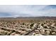 Panoramic aerial view featuring community with desert landscaping, tiled roofs and breathtaking mountain backdrop at 15235 S 30Th St, Phoenix, AZ 85048