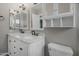 Elegant bathroom with dual sinks, marble countertop, and a vanity with ample storage at 15235 S 30Th St, Phoenix, AZ 85048