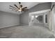 Expansive bedroom featuring a ceiling fan and a large bay window at 15235 S 30Th St, Phoenix, AZ 85048