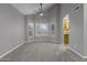 Bright living room with neutral paint, carpet, and a bay window, creating a warm and inviting space at 15235 S 30Th St, Phoenix, AZ 85048