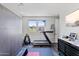 Bright home gym features modern exercise equipment and ample natural light at 1555 E Ocotillo Rd # 16, Phoenix, AZ 85014
