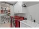 Well-organized laundry room with bright cabinets, modern appliances, and plenty of storage at 1555 E Ocotillo Rd # 16, Phoenix, AZ 85014