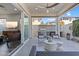 Cozy outdoor patio with modern seating, built-in barbecue, and seamless indoor-outdoor living at 1555 E Ocotillo Rd # 16, Phoenix, AZ 85014