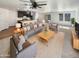 Spacious living room features modern furniture and an open floor plan at 16236 W La Ventilla Way, Goodyear, AZ 85338