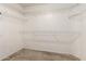 Walk-in closet with wire shelving, providing ample storage space at 1642 E Desert Ln, Phoenix, AZ 85042