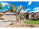 Charming single-story home featuring a low maintenance yard and attached two-car garage at 1642 E Desert Ln, Phoenix, AZ 85042