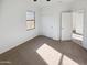 Bedroom featuring a closet, and bright light from the window at 19904 W Sherman St, Buckeye, AZ 85326