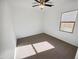 Cozy bedroom with carpet and natural light streaming through a window at 19904 W Sherman St, Buckeye, AZ 85326