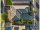 Overhead view of home with tile roof, patio, and a dark colored SUV in the driveway at 22193 E Via Del Oro --, Queen Creek, AZ 85142